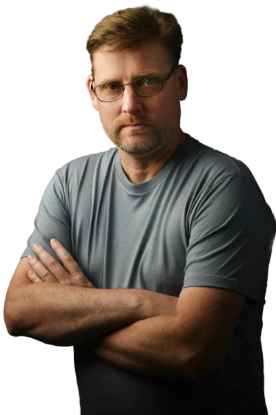 Will Vincent, Voice Actor, standing with arms crossed.