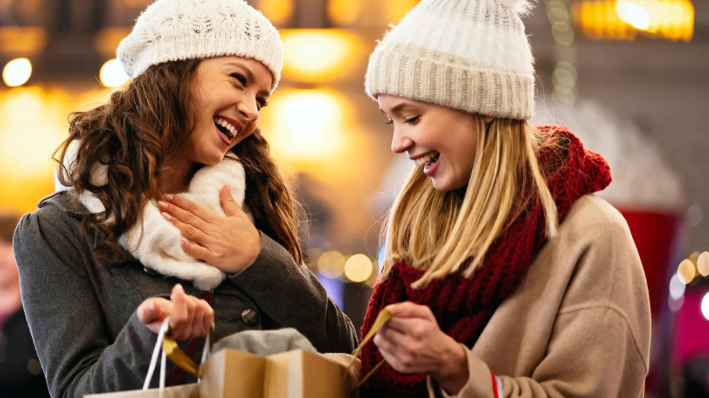 Happy women shopping for Christmas